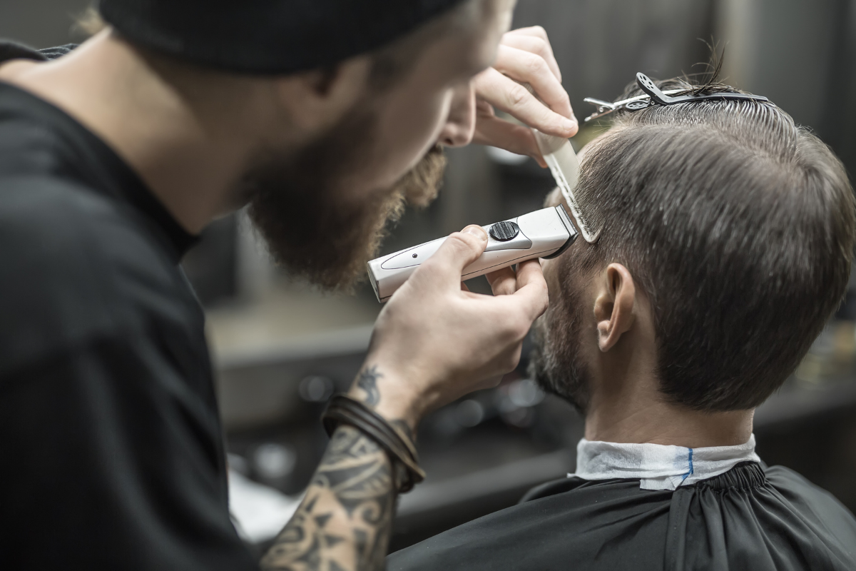 man in barbershop silver hair