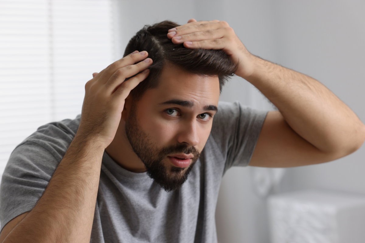 a man in cold weather with dry hair