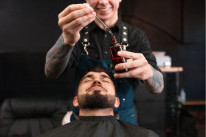 full beard gently applying oil